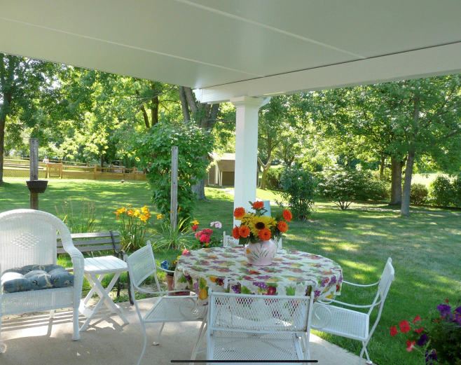 patio cover with outdoor living area underneath